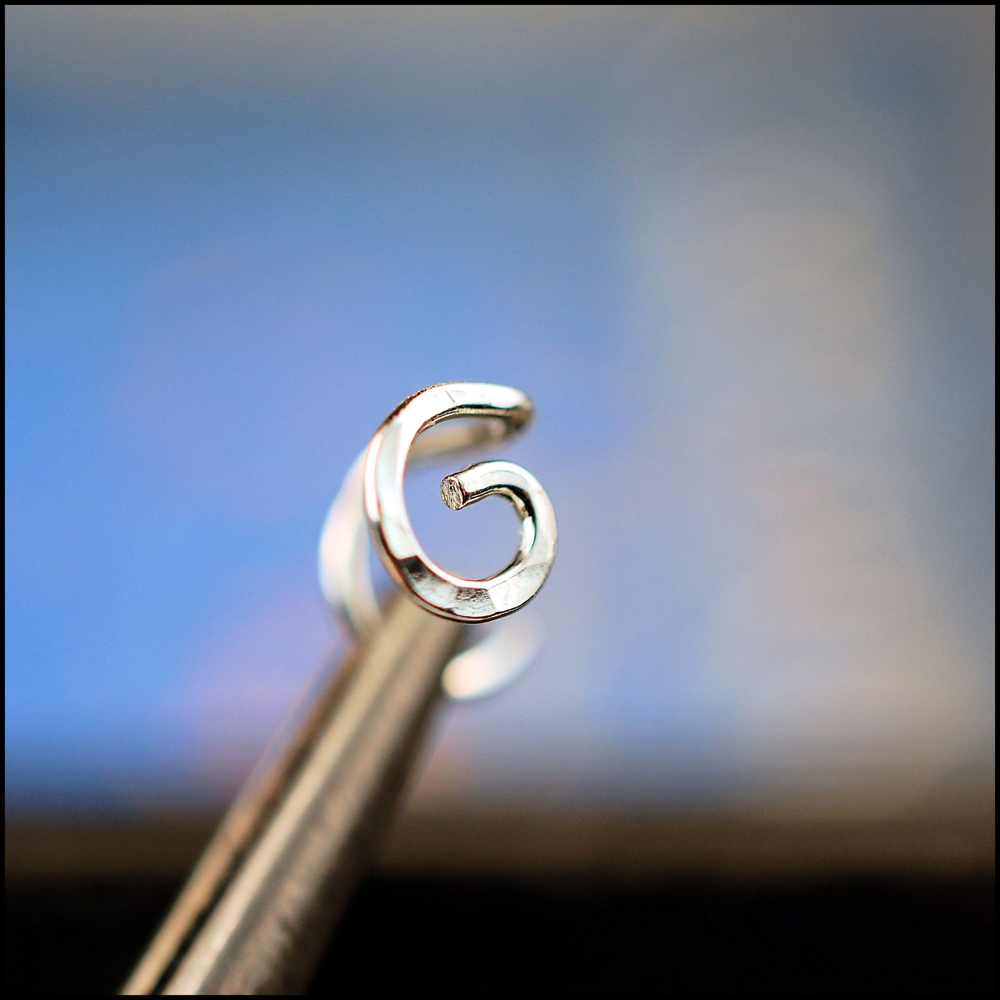 spiral nose stud in sterling silver