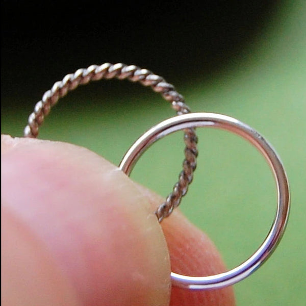 pair of sterling silver nose rings