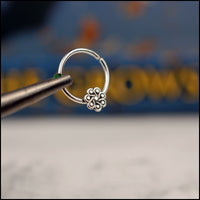 dainty flower septum hoop in sterling silver