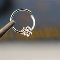 nickel-free sterling silver nose hoop with tiny flower