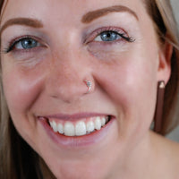 dainty flower nose ring in sterling silver