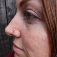 serpent nose stud in rose gold