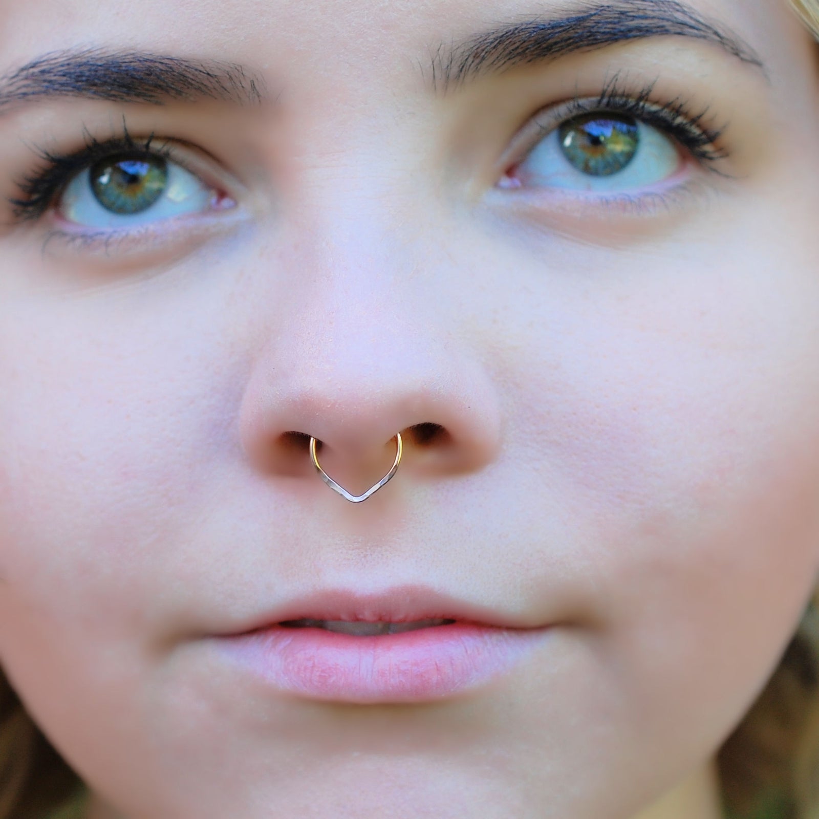 Septum ring in regular nose piercing hotsell