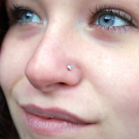 14 karat rose gold nose stud with rainbow moonstone gemstone