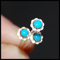 nickel-free sterling silver nose stud in flower with turquoise gemstone