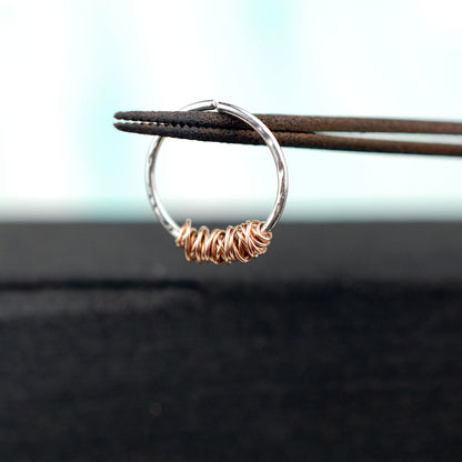 sterling silver septum hoop with 14 karat rose gold