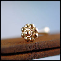 dainty flower nose stud in 14k yellow gold