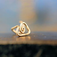 gold tribal triangle nose stud