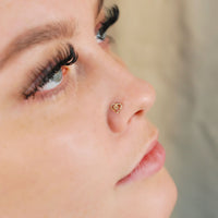 gold tribal triangle nose stud