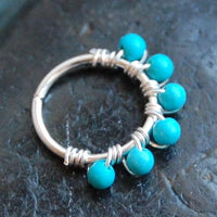 sterling silver nose ring wrapped with turquoise gemstones