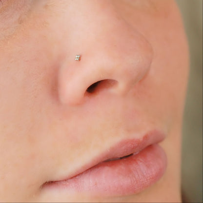 tiny flower nose stud in sterling silver