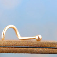 solid 14 karat yellow gold nose stud