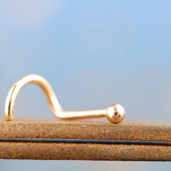 solid 14 karat yellow gold nose stud