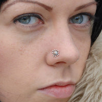 Gold and silver nose stud