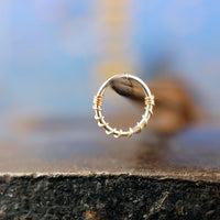 gold and silver nose hoop