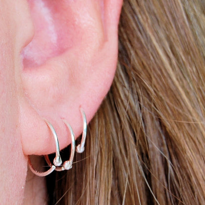 graduated set of sterling silver hoops