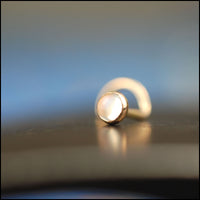 14k yellow gold nose stud with rainbow moonstone