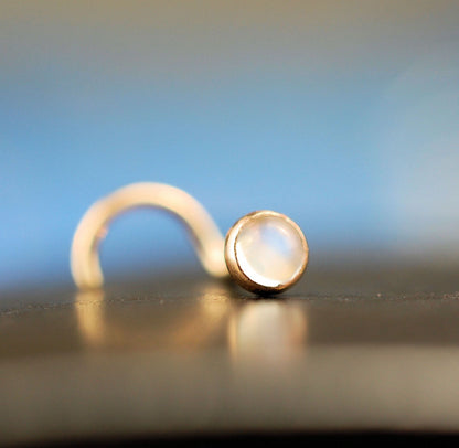 rainbow moonstone gemstone in 14 karat yellow gold nose stud