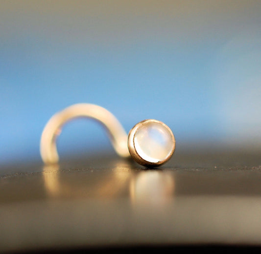 rainbow moonstone gemstone in 14 karat yellow gold nose stud